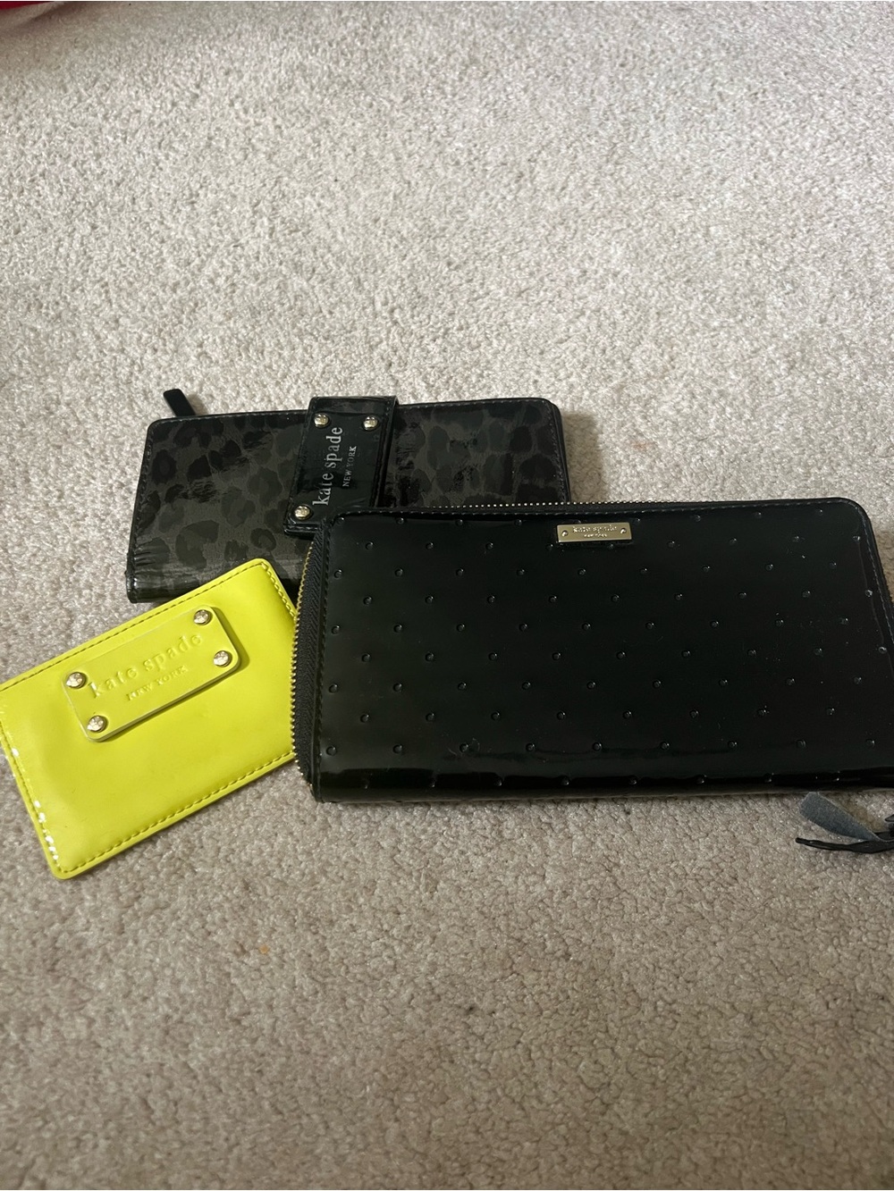 3  Kate Spade Black Wallets, 2 Black and
 1 Neon Yellow Card Holder